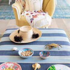 Striped Blue Ottoman and Yellow Armchair