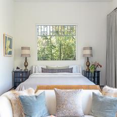Transitional Bedroom With Large Window
