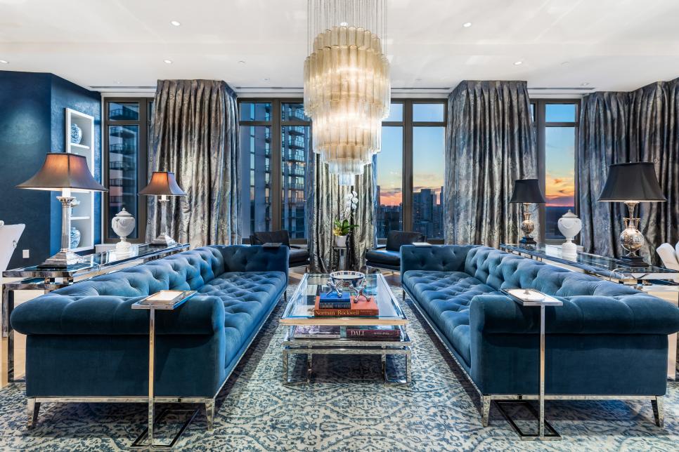 Luxe Living Room With Center Chandelier, Skyline View From All Windows