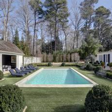 Backyard With Pool and Hedges