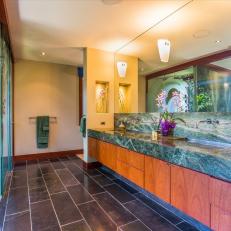 Tropical Bathroom With Green Countertop