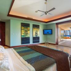Blue Tropical Bedroom With TV