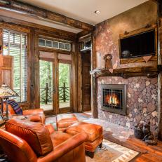 Quaint and Cozy Sitting Room With Big Leather Chairs in Rustic Countryside Home