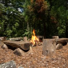 Rustic Outdoor Fire Pit With Hewn Log Benches