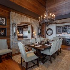 Luxurious Dining Room With Stone Half Wall in Mountaintop North Carolina Home
