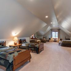 Expansive Carpeted Bonus Room Outfitted With Multiple Beds