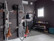 Wall-Mounted Bike Racks Near Garage Home Gym
