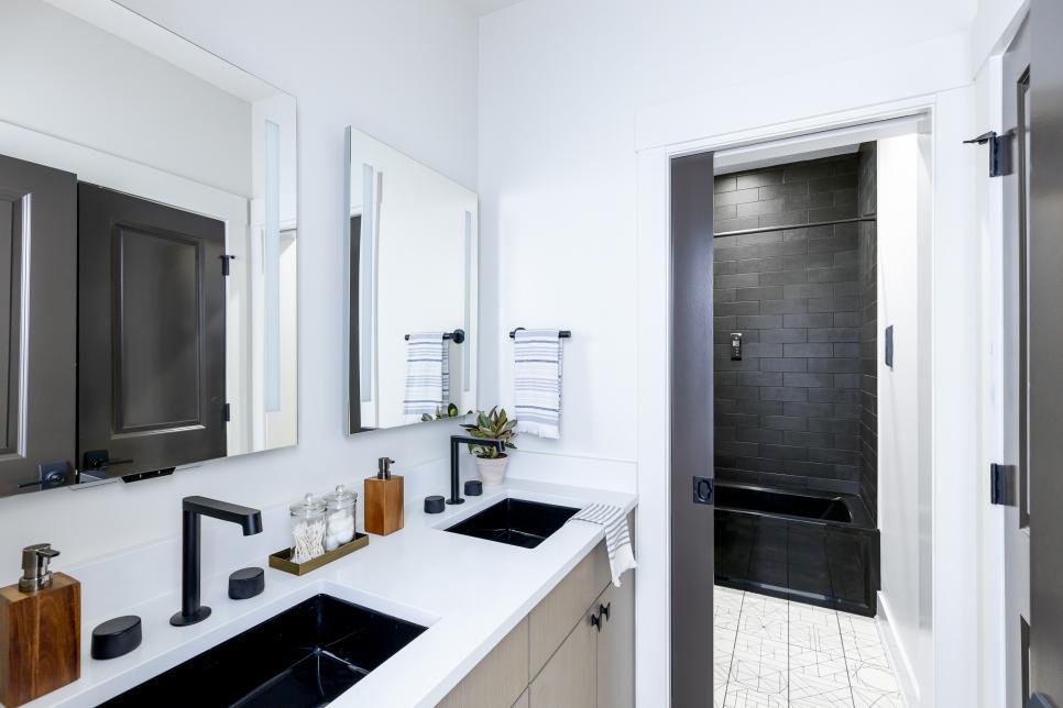 Black-and-White Palette in Hall Bathroom Creates Sleek Aesthetic