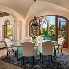 Mediterranean-Style Dining Room With Arched Ceilings