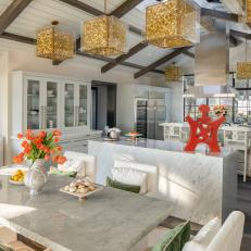 Open Plan Kitchen and Dining Area With Orange Tulips