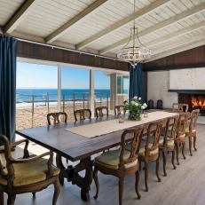 Beachfront Dining Room With Blue Curtains