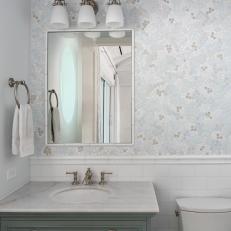 Small White Bathroom With Mosaic Tile Backsplash