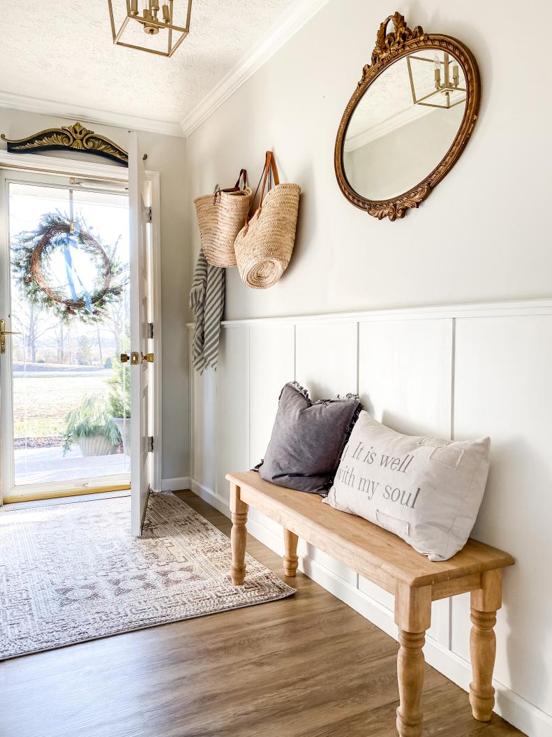 Take a step inside Amy’s supercute entryway and you’ll feel it. A gold vintage mirror — the standout piece of this space — is the first accessory that’ll catch your eye. But look a little closer and you’ll notice beautiful woven baskets hanging next to the doorway and a natural wooden bench. “I certainly think there is a farmhouse element to French vintage,” explains Amy. “This style is so enamoring to me because it’s also functional, and, like a farmhouse, everything in the space has a purpose.”