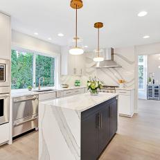 White Transitional Kitchen With Glass Pendants