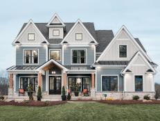Blue-and-White Craftsman Home Features Multiple Gable Dormers