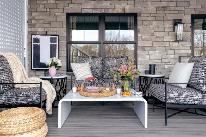 Black-and-White-Upholstered Outdoor Seating Dresses Up Covered Patio
