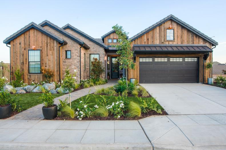 The Reeder Family went from their two bedroom 900sf rental to this spacious 2400sf,  4 bedroom 3 bath Rustic Mountain Retreat!  Built with love and purpose, the design team wanted the Reeder family to feel like they are on an extended vacation in their new zero energy, forever home. With reclaimed wood details and solar panels, it's a perfect blend of rustic style and modern technology.  The solar panels are imperative for keeping energy costs low with a climate that hits triple digits. The white rose bushes were planted in honor of Amanda Reeder.