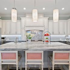 Gray Chef Kitchen With Pink Barstools