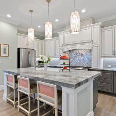 Gray Eat-In Kitchen With Pink Barstools