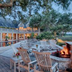 Intimate Outdoor Fireplace Behind Southern Mansion Overlooking Marsh