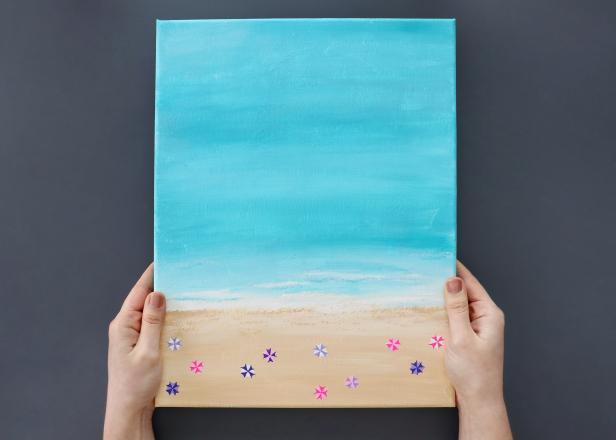 Let dry completely and then you can display your finished beach artwork.
