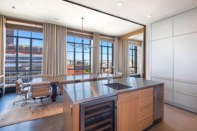 Kitchen Island With Dining Room View, 12 Chairs and Tall Windows