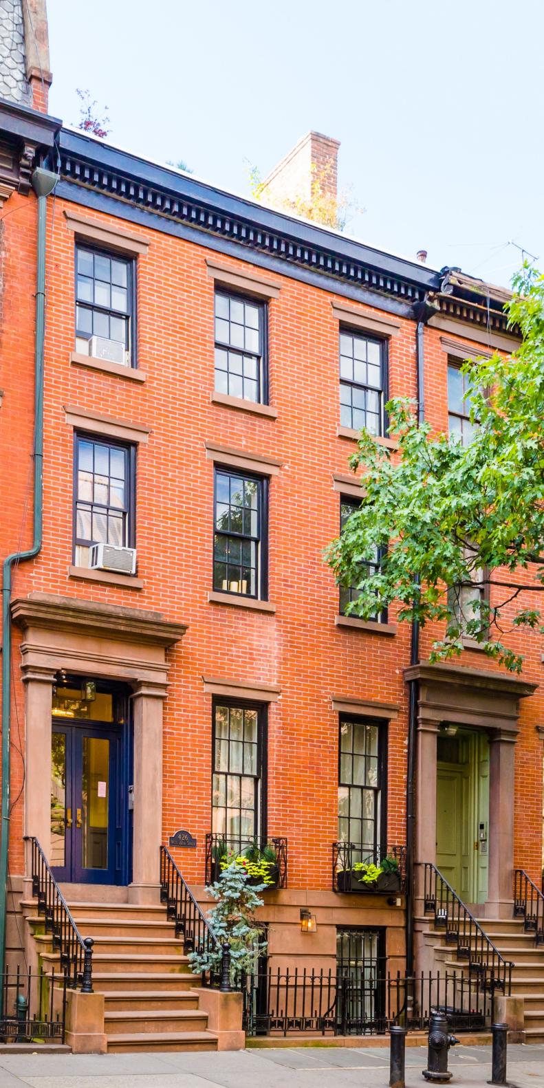 Red Brick Exterior, Blue Door and Roof Trim on West Chelsea Townhouse