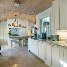 Traditional Kitchen With Farmhouse Sink and White Cabinets
