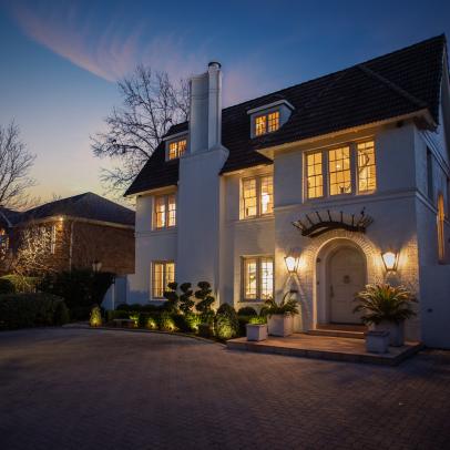 Classic Colonial-Style Home at Night