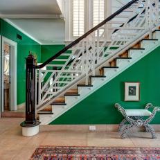 Green Foyer With Modern Stairs