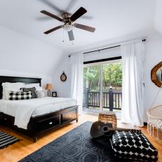 Black-And-White Bedroom With Patio Access