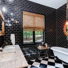 Modern Bathroom With Black Tile Walls