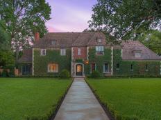 Traditional Tudor Exterior, Front Yard, Ivy Covered Facade at Sunset 
