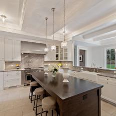 White Transitional Kitchen With Wooden Island