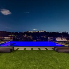 Modern Backyard With Blue Infinity Pool