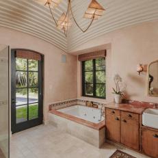 Unique Master Bathroom With a Bespoke Vaulted Ceiling, Custom Tile and Countertops