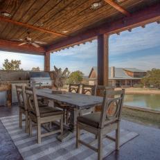 Luxurious Covered Outdoor Kitchen and Dining Area at Texas Cabin