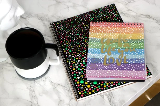 Use this method to add dots to any notebooks you have, working around the existing design elements if needed. Experiment with different designs you can make on different types of notebooks.
