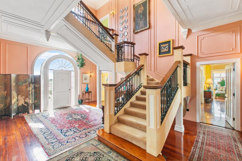Orange Traditional Foyer With Stairs