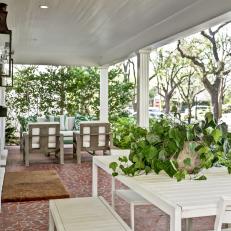 Low Country-Style Porch With Terrazzo-Inspired Floor