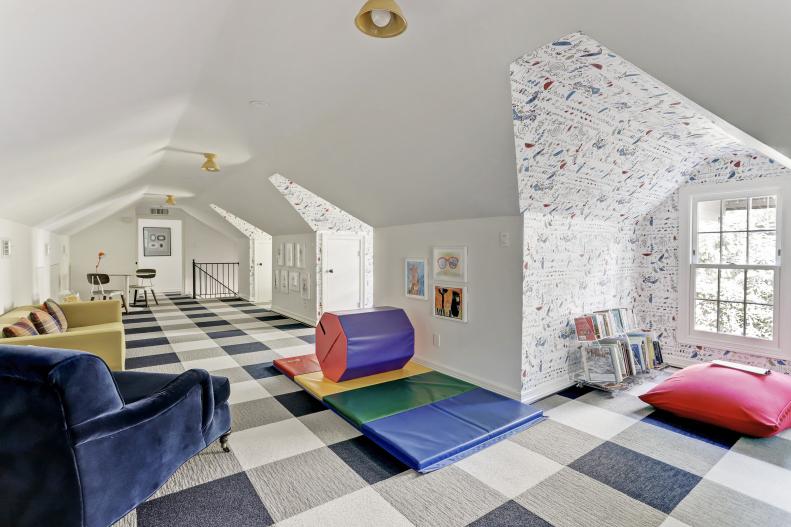 Large Bonus Room With Vaulted Ceilings and Carpet Tiles