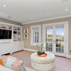 Transitional Media Room With Orange Pillows