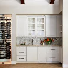 Transitional Wine Room With White Cabinets