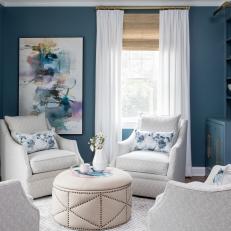 Blue Transitional Sitting Room With Ottoman