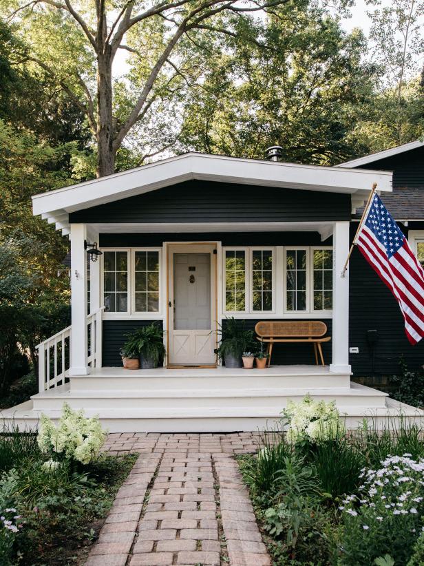 Designer Kate Marker doesn’t usually believe in fate, but all signs pointed to the fact that a 1,400-square-foot, one story cottage in Union Pier, Michigan was destined to be hers. It wasn’t just the picturesque surrounding town or the fact that she could hear waves crashing on the nearby beach from the home’s entryway. “It smelled like the right place,” she says. “That cottage-y, cabin-y smell and feel and vibe.” Kate and her husband purchased the 1920’s structure immediately and soon got to work gutting the entire space. In just two months — “My fastest project ever!” — Kate and her team took the home from a ho-hum space with zero updated amenities, to a curated, eclectic cottage filled with vintage touches, natural materials and some pretty edgy pieces. Oh, and did we mention you can rent it out?