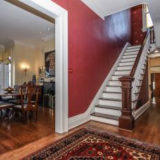 Dramatic Foyer With Red Walls