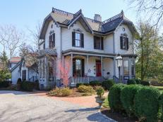 Classic Victorian Home Exterior With Landscaped Driveway