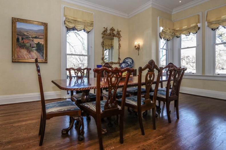 Formal Dining Room, Wooden Table and Chairs, Ornate Framed Artwork