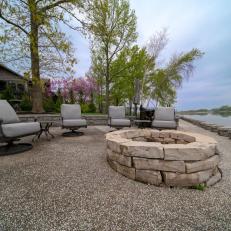 Waterfront Patio With Stone Fire Pit