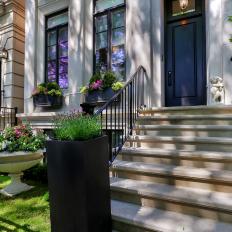Row House Exterior With Potted Plants